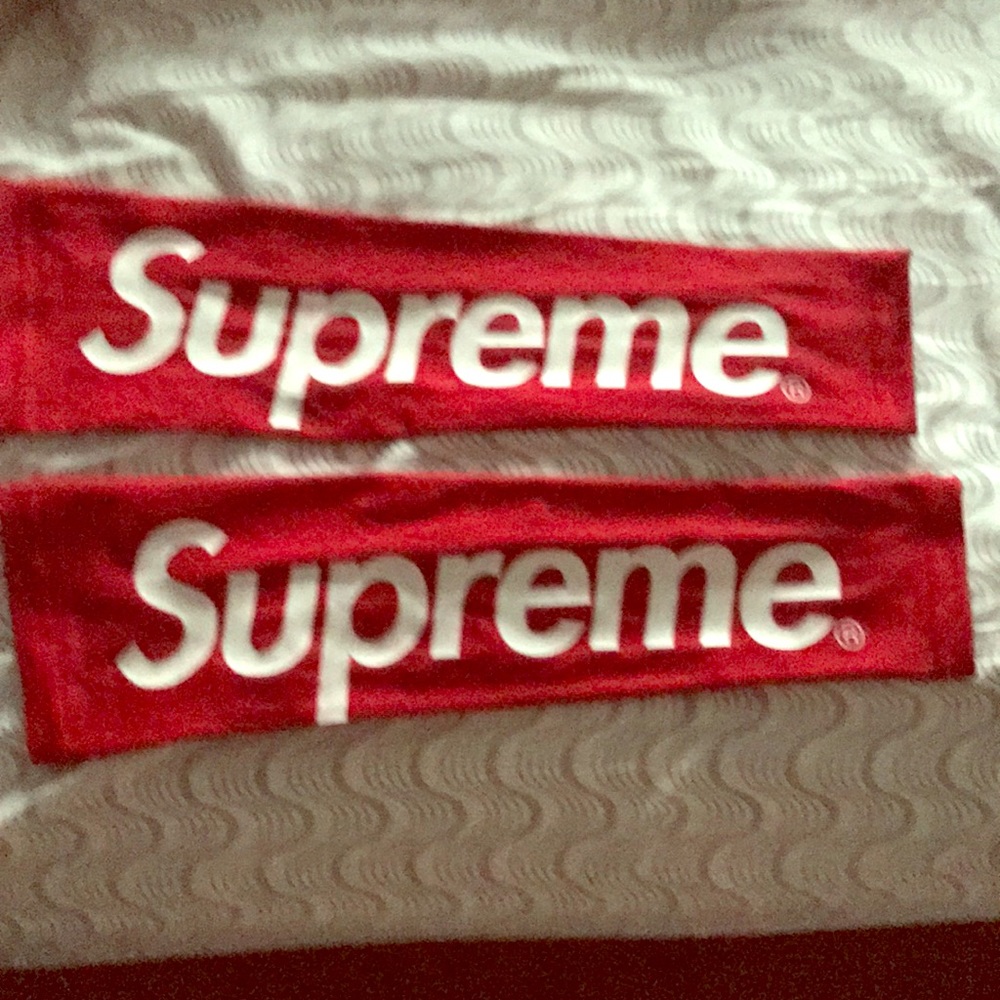 Two lightly used Supreme shooting Sleeves
